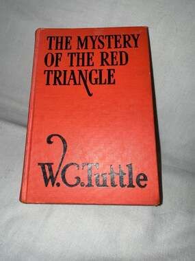 The Mystery of the Red Triangle by W.C. Tuttle (Grosset & Dunlap, 1944)